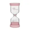 A pink and clear hourglass timer on a white background. Voir les images du produit