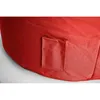 A close-up view of a red beanbag chair, showing a small pocket detail. Produktbild-Vorschau