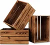 Three wooden crates are stacked and arranged in a visually appealing way against a white background. Produktbild-Vorschau