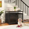 A dog is lying on a rug in front of a dog crate that is placed under a staircase. The crate also functions as a side table. Podgląd zdjęcia produktu