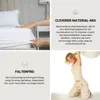 A collage of images showcasing a fitted sheet, including a close-up of someone putting it on a mattress, marketing text about the material mix, a graphic indicating it's wrinkle-free, and a woman playfully holding a pillow. Produktbild-Vorschau