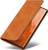 A brown leather flip cover case for a smartphone is shown on a white background. Produktbild-Vorschau