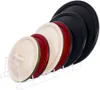 A white wire rack holding several pot lids of different colors. Anteprima dell’immagine prodotto