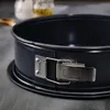 A close-up shot of a black springform pan with a silver latch and branding. Produktbild-Vorschau