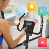 A woman is using a stationary exercise bike, with various app icons overlaid on the image. Produktbild-Vorschau