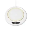 A white circular cup warmer with a digital display showing the temperature. Produktbild-Vorschau