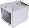 A white cake box with a window and a handle. Anteprima dell’immagine prodotto
