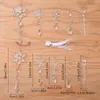 A collection of clear, snowflake and icicle-shaped ornaments arranged on a wooden surface. Náhľad obrázku produktu