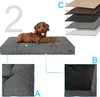 A dog lying on a dog bed, with close-up views of the bed's construction and a diagram showing material layers. Voir les images du produit