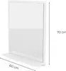 A white bathroom mirror with a shelf attached to the bottom, shown against a white background. Dimensions are indicated with text. Produktbild-Vorschau