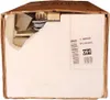 A damaged cardboard box containing a product with white foam packaging. Voir les images du produit