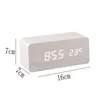 A digital alarm clock with dimensions indicated by measurement lines. Produktbild-Vorschau