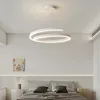 A modern bedroom with a pendant light above a bed. Produktbild-Vorschau