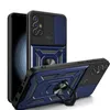 A blue and black phone case with a ring stand is shown against a white background. The case has a sliding camera cover and a textured design. Produktbild-Vorschau