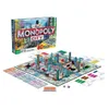 A Monopoly City board game set up on a table, with the game box in the background. Produktbild-Vorschau