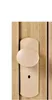 A close-up of a door handle and lock mechanism on a wooden door. Podgląd zdjęcia produktu