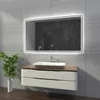A modern bathroom vanity with a sink and a large illuminated mirror. Produktbild-Vorschau