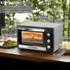 A Steinborg mini oven is shown on a wooden table with some food and drinks in the background. Produktbild-Vorschau