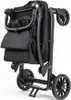 Aufrecht stehendes Gestell des Kettler Klappbollerwagens Compact in Schwarz, einfach zu transportieren und zu verstauen. Produktbild-Vorschau