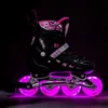 A black inline skate with pink accents and glowing pink wheels against a black background. Produktbild-Vorschau