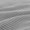 A close-up view of a gray corduroy fabric with a wavy texture. Produktbild-Vorschau