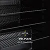 Close-up view of the interior of a refrigerator, showing multiple shelves. Produktbild-Vorschau