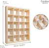 A wooden shelf unit with multiple compartments, shown with dimensions indicated by measurement lines and text. Produktbild-Vorschau