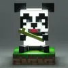 A pixelated panda figurine holding a bamboo stalk, sitting on a grass-like base. Náhled obrázku produktu