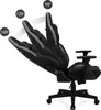 A black gaming chair shown from the side with indicators showing different reclining angles. Produktbild-Vorschau