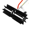 A close-up view of a powered sweeper attachment for a garden tool. Produktbild-Vorschau