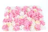 A close-up view of a wall panel covered in artificial flowers. Podgląd zdjęcia produktu
