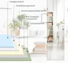 A diagram illustrating the layers of a mirror, with a blurred background of a room. Produktbild-Vorschau