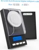 A digital milligram scale with a protective cover and a blue LCD display. Podgląd zdjęcia produktu