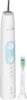 A white electric toothbrush and its brush head are displayed against a white background. Náhľad obrázku produktu