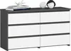 A modern dresser with six drawers in a graphite gray and white finish, displayed against a white background. Decorative objects are placed on top.