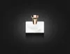 A white perfume bottle with a gold cap is centered on a black background. Náhled obrázku produktu
