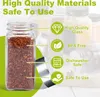 A close-up of a glass spice jar filled with red pepper flakes, with icons and text highlighting product features. Voir les images du produit