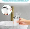 A person is washing a vacuum cleaner filter under a faucet in a sink. Produktbild-Vorschau