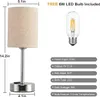 A table lamp with dimensions and features listed, alongside an included LED bulb. Produktbild-Vorschau