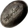 A close-up, isolated shot of a bar of African black soap. Podgląd zdjęcia produktu