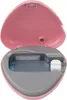 An open pink heart-shaped case for a toothbrush sanitizer, showing the interior compartments. Náhľad obrázku produktu