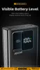 Close-up of a black power bank with a digital display showing 100% charge. Produktbild-Vorschau