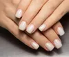 A close-up shot of a person's hands with neatly manicured nails. Náhled obrázku produktu