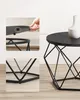 Collage showing details of a black coffee table with a geometric metal base and a wooden top. Náhled obrázku produktu