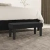 A black velvet bench is placed in front of a bed on a carpeted floor. Náhľad obrázku produktu