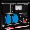 A close-up view of the control panel of a generator, showing various outlets, a voltmeter, and a breaker switch. Anteprima dell’immagine prodotto