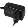 A black power adapter with European plug pins. Produktbild-Vorschau