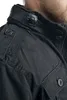Close-up of a black jacket worn by a person. Produktbild-Vorschau