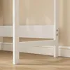 Close-up of the base of a white bed frame or desk. Náhľad obrázku produktu