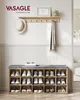 A shoe bench with a cushioned top, displaying various shoes in its compartments, with a coat rack above holding a hat and scarf. Produktbild-Vorschau
